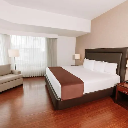 Clarion Suites Guatemala City Exterior foto A bedroom at the hotel